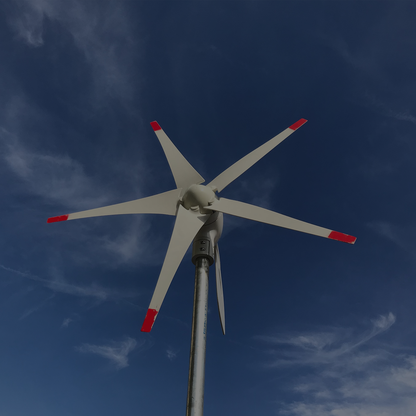 Scene - Wind turbine against a blue sky with some clouds